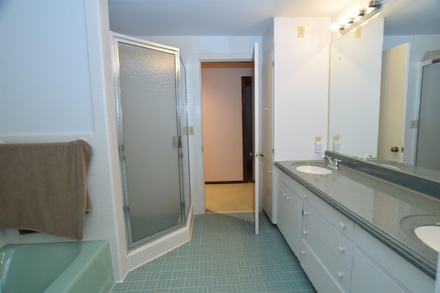 5400 Siebert St, Midland, MI 48640 - bathroom with double vanity, a stall shower, and a bath