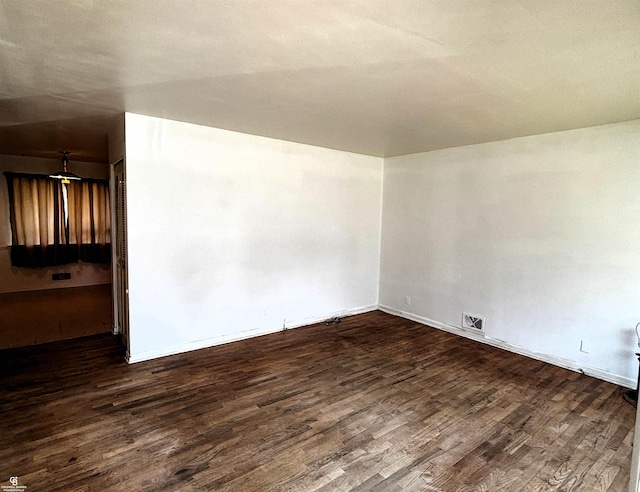 3109 Yale St, Flint, MI 48503 - empty room featuring wood finished floors and baseboards