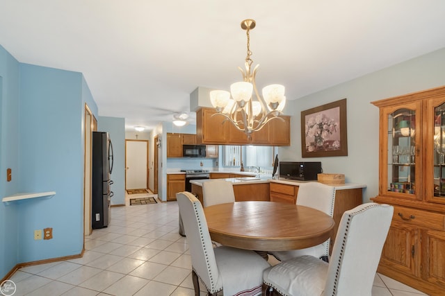 52225 Bryan Michael Dr, Macomb, MI 48042 - dining space with a chandelier and light tile patterned flooring
