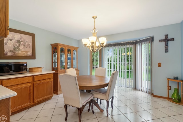 52225 Bryan Michael Dr, Macomb, MI 48042 - dining area featuring a chandelier and light tile patterned floors