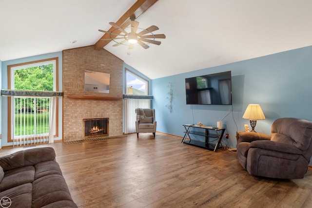 52225 Bryan Michael Dr, Macomb, MI 48042 - living area featuring ceiling fan, healthy amount of natural light, wood finished floors, and a brick fireplace
