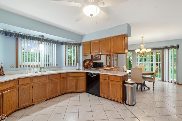 52225 Bryan Michael Dr, Macomb, MI 48042 - kitchen with black dishwasher, brown cabinets, light tile patterned flooring, and a chandelier