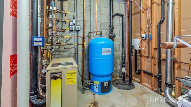 533 25th St, Gladstone, MI 49837 - utility room featuring a heating unit