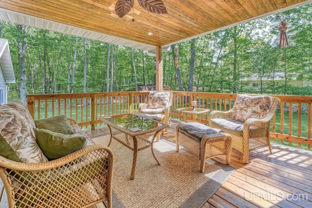 533 25th St, Gladstone, MI 49837 - wooden terrace featuring ceiling fan and an outdoor living space