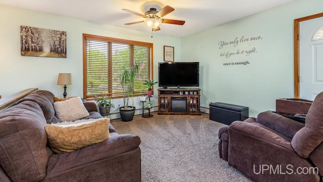 533 25th St, Gladstone, MI 49837 - living room featuring carpet, ceiling fan, and a baseboard radiator