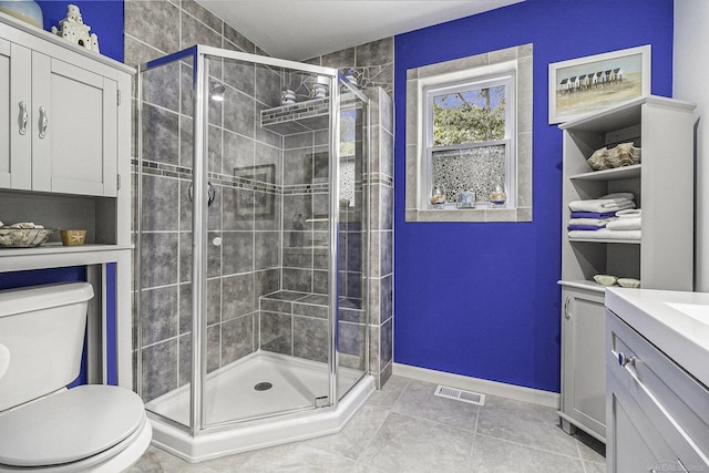 1335 28th St, Manistee, MI 49660 - full bathroom featuring vanity, a shower stall, and tile patterned floors
