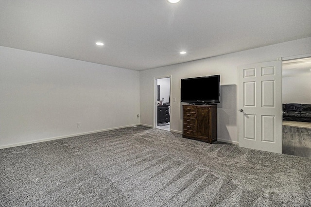 1335 28th St, Manistee, MI 49660 - unfurnished living room with recessed lighting and carpet floors