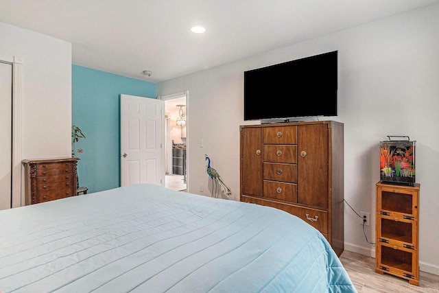 1335 28th St, Manistee, MI 49660 - bedroom featuring light wood-type flooring and recessed lighting