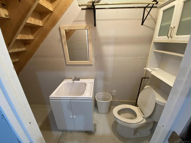 1335 28th St, Manistee, MI 49660 - half bathroom with toilet and vanity