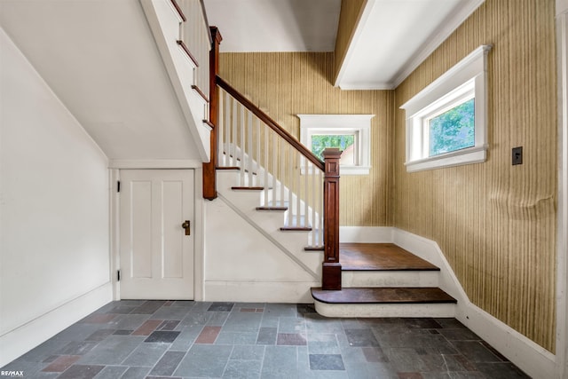 1200 Wells St, Ann Arbor, MI 48104 - staircase with stone tile flooring and baseboards