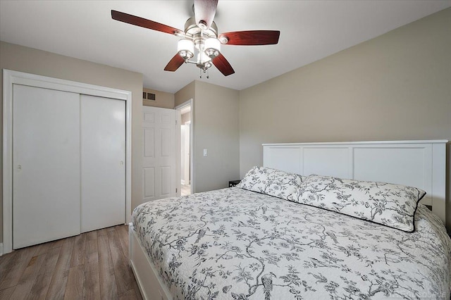 37738 Maplehill St, Harrison Twp, MI 48045 - bedroom featuring wood finished floors, a closet, and a ceiling fan