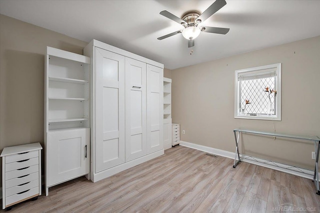 37738 Maplehill St, Harrison Twp, MI 48045 - unfurnished bedroom featuring light wood-style flooring, a closet, and a ceiling fan