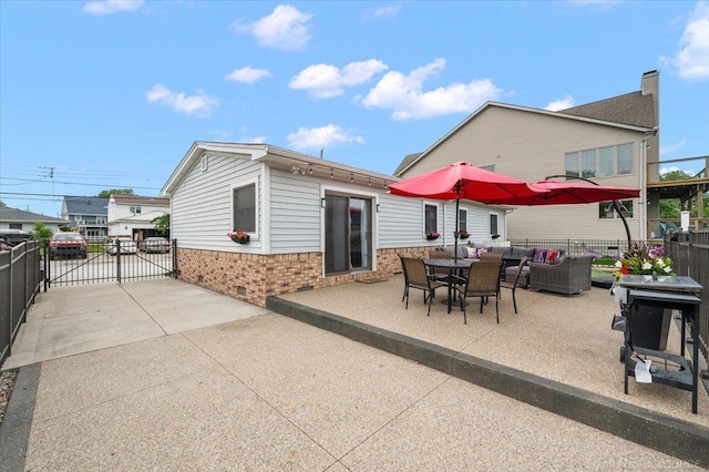 37738 Maplehill St, Harrison Twp, MI 48045 - back of property featuring brick siding, an outdoor living space, a patio area, and a gate
