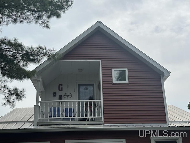 21988 E Everett Ave, Grand Marais, MI 49839 - view of side of property featuring a balcony