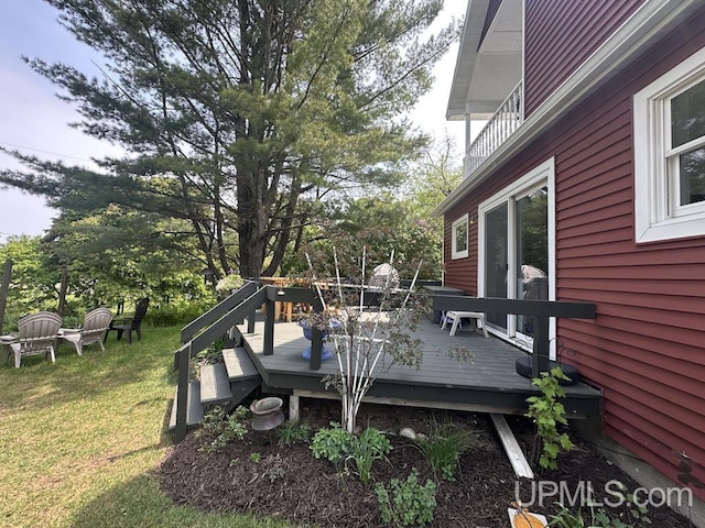 21988 E Everett Ave, Grand Marais, MI 49839 - wooden terrace with a lawn