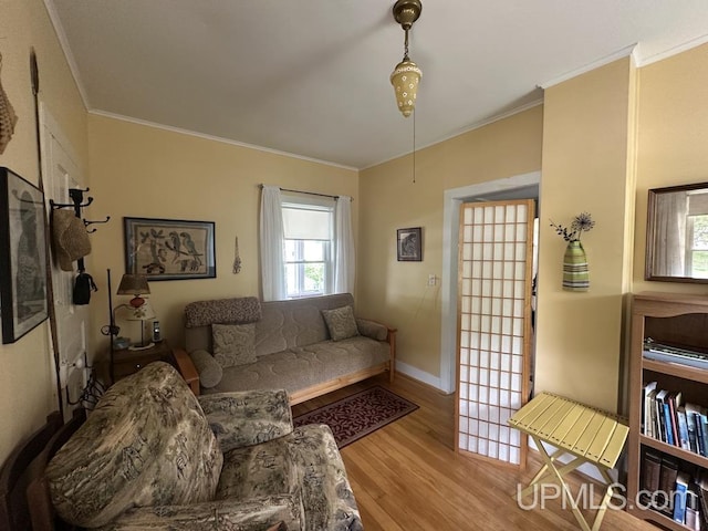 21988 E Everett Ave, Grand Marais, MI 49839 - living room featuring wood finished floors and ornamental molding
