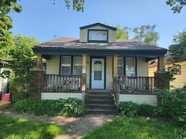 145 W Bernhard Ave, Hazel Park, MI 48030 - bungalow-style house with covered porch and roof with shingles