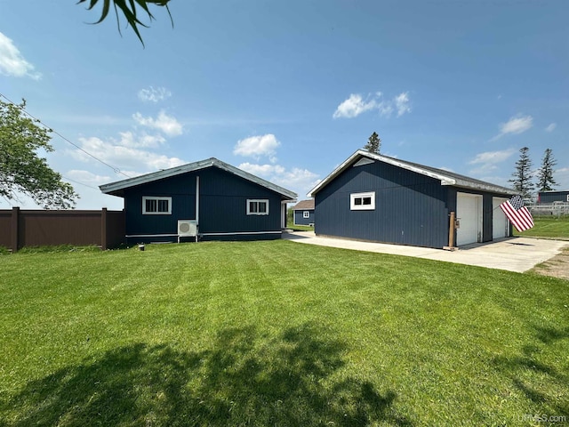 5847 County 513 T Rd, Rapid River, MI 49878 - back of property with a detached garage and an outbuilding