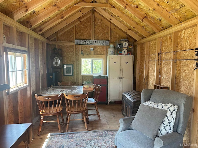 5847 County 513 T Rd, Rapid River, MI 49878 - dining area featuring vaulted ceiling and hardwood / wood-style floors