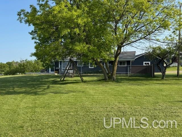 5847 County 513 T Rd, Rapid River, MI 49878 - view of grassy yard