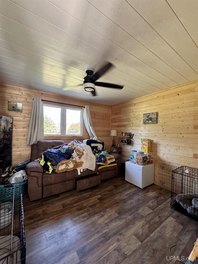 4828 I Rd, Bark River, MI 49807 - bedroom with wood finished floors, wooden walls, and ceiling fan