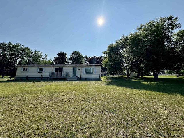 4828 I Rd, Bark River, MI 49807 - view of front of property with crawl space, a front yard, and a deck