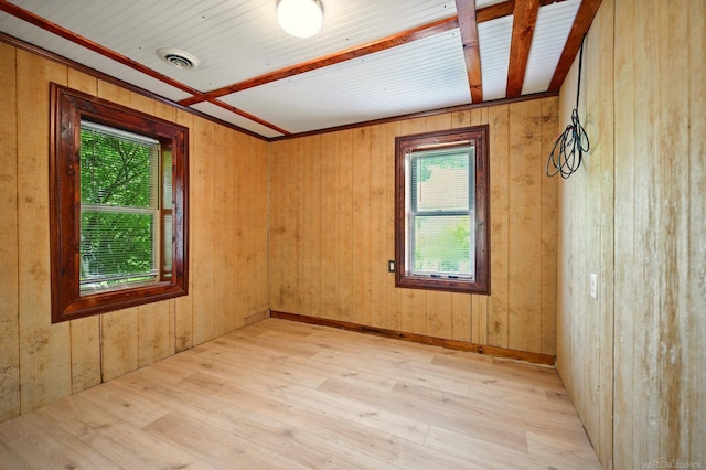 9970 Sedlock Ave, White Lake, MI 48386 - empty room featuring light wood-style flooring and wooden walls