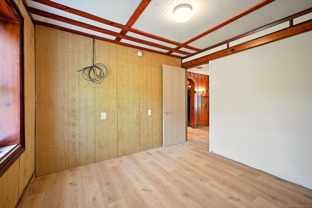 9970 Sedlock Ave, White Lake, MI 48386 - unfurnished room featuring wood finished floors and wooden walls