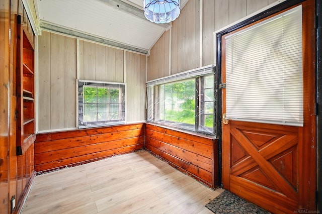 9970 Sedlock Ave, White Lake, MI 48386 - unfurnished sunroom with vaulted ceiling