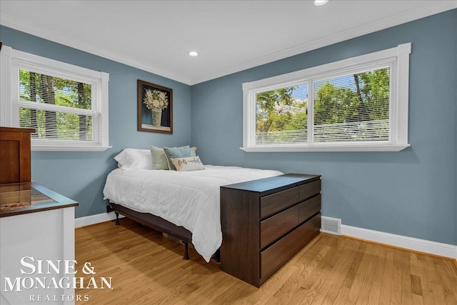 1076 Kelley St, Troy, MI 48083 - bedroom with light wood-style flooring, recessed lighting, and ornamental molding