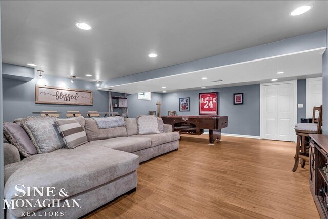 1076 Kelley St, Troy, MI 48083 - living room featuring light wood-type flooring and recessed lighting