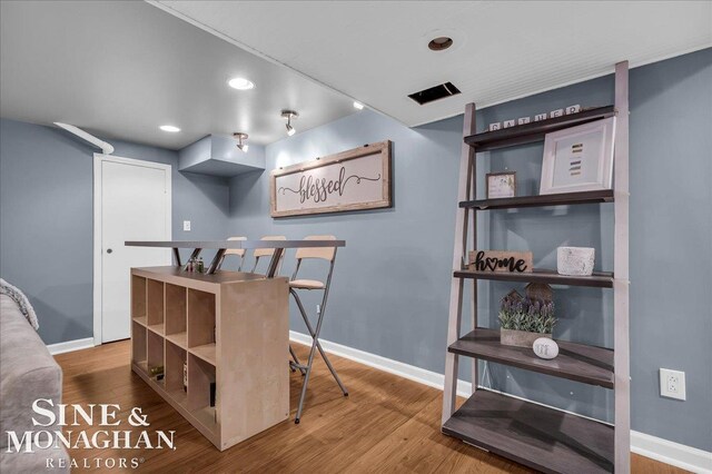 1076 Kelley St, Troy, MI 48083 - dining space with wood finished floors and recessed lighting
