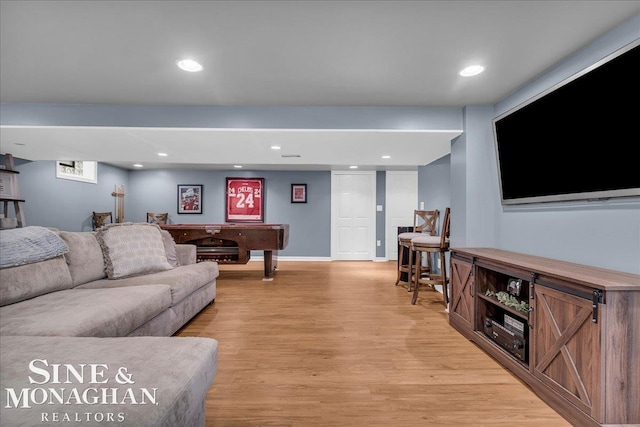 1076 Kelley St, Troy, MI 48083 - living area featuring light wood finished floors and recessed lighting