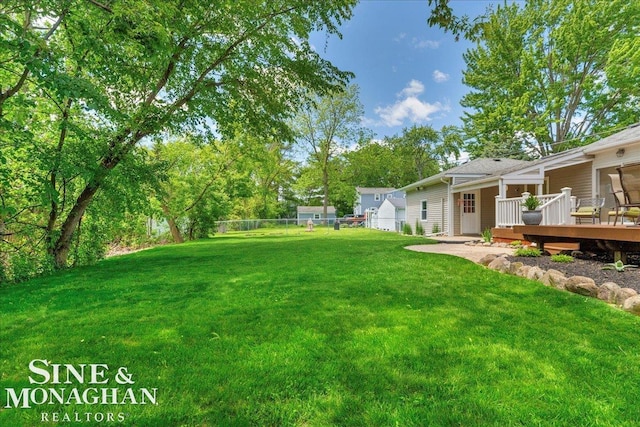 1076 Kelley St, Troy, MI 48083 - view of yard with a wooden deck