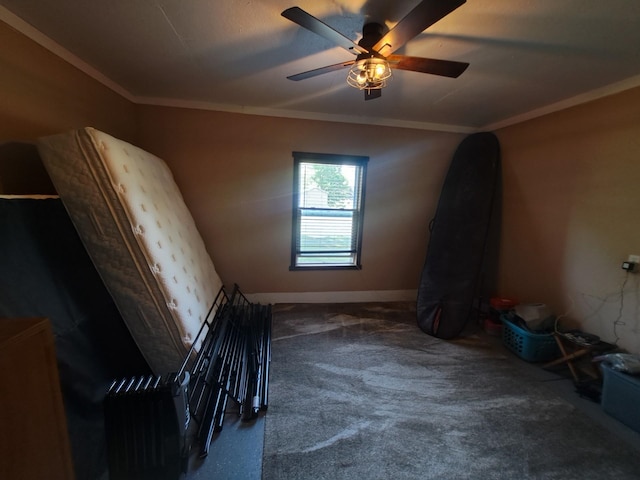 250 Witbeck Dr, Clare, MI 48617 - unfurnished bedroom with carpet, ornamental molding, and a ceiling fan