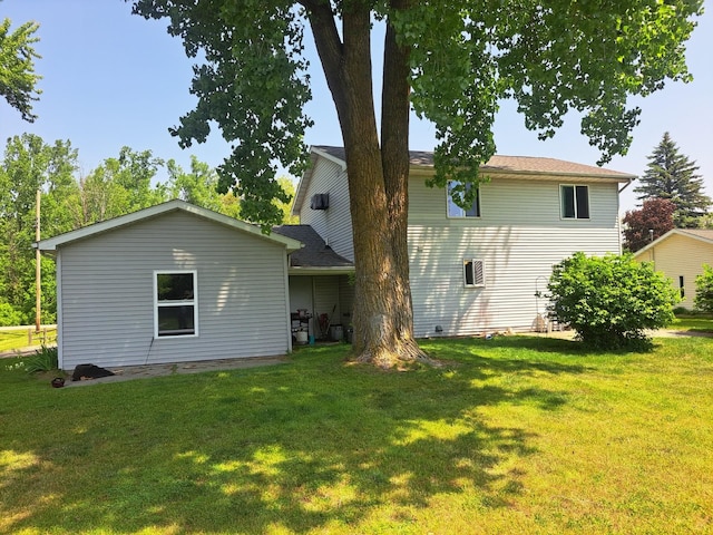 250 Witbeck Dr, Clare, MI 48617 - back of house featuring a yard