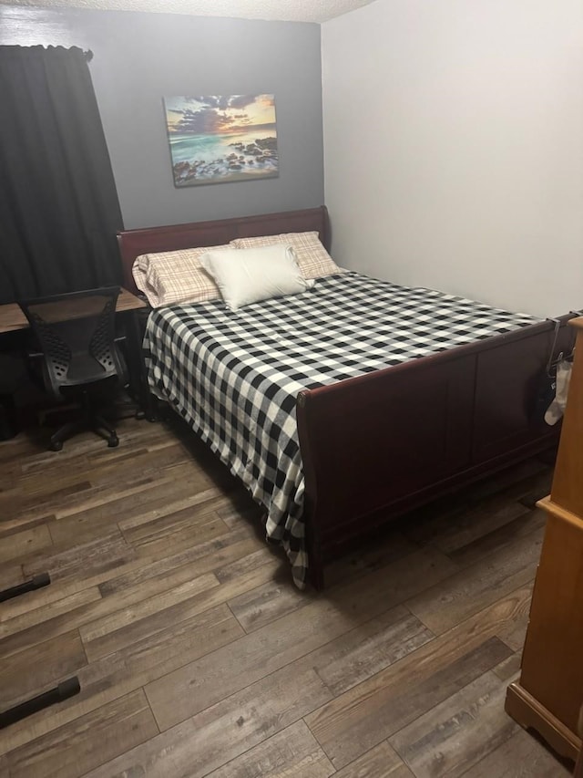 250 Witbeck Dr, Clare, MI 48617 - bedroom with wood-type flooring
