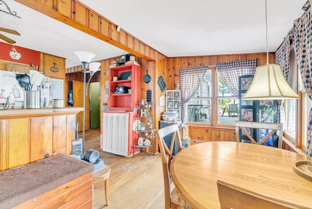 8941 Lakeshore Rd, Lexington, MI 48450 - dining space featuring wooden walls and wood finished floors