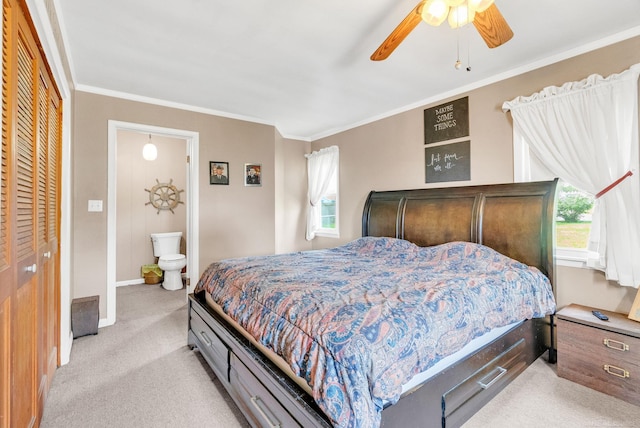 8941 Lakeshore Rd, Lexington, MI 48450 - bedroom with light colored carpet, multiple windows, ornamental molding, ceiling fan, and connected bathroom