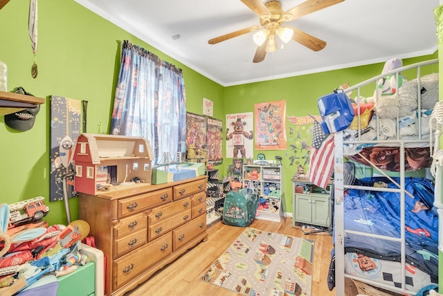 8941 Lakeshore Rd, Lexington, MI 48450 - bedroom featuring light wood-type flooring, crown molding, and a ceiling fan