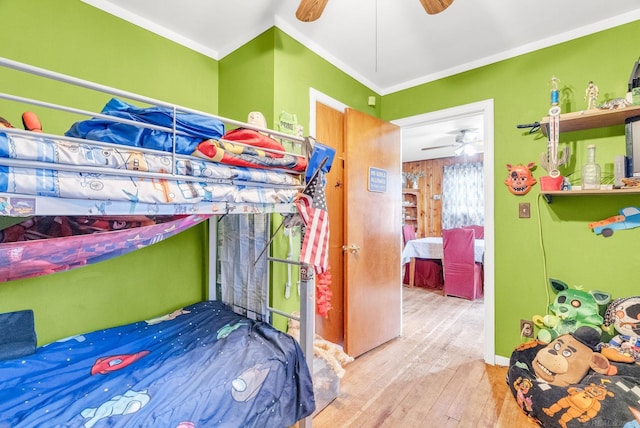 8941 Lakeshore Rd, Lexington, MI 48450 - bedroom featuring wood-type flooring, ornamental molding, and ceiling fan
