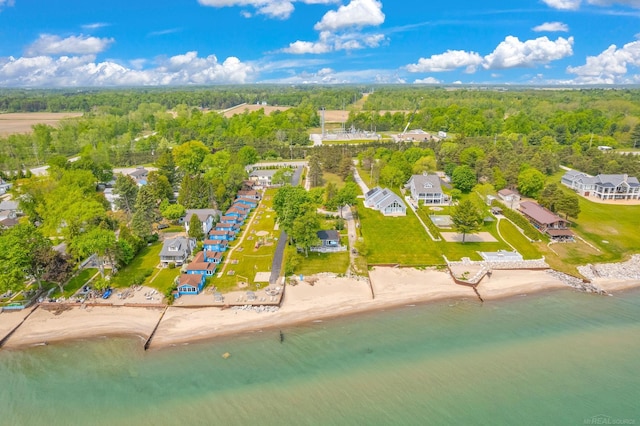 8941 Lakeshore Rd, Lexington, MI 48450 - aerial perspective of suburban area featuring a heavily wooded area and extended coastline