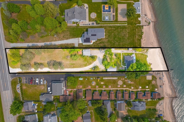 8941 Lakeshore Rd, Lexington, MI 48450 - aerial view of residential area featuring property parcel outlined and a large body of water