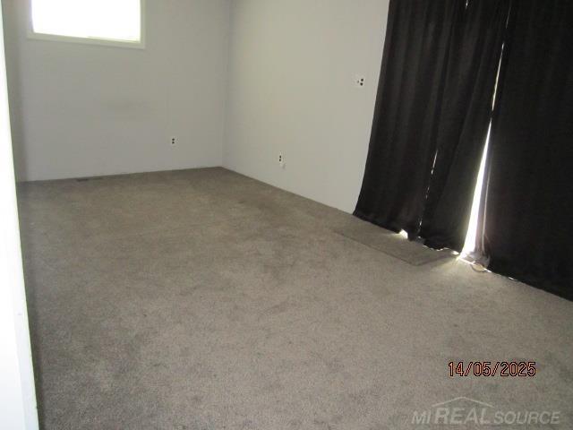 22636 Downing St, Saint Clair Shores, MI 48080 - empty room featuring carpet flooring