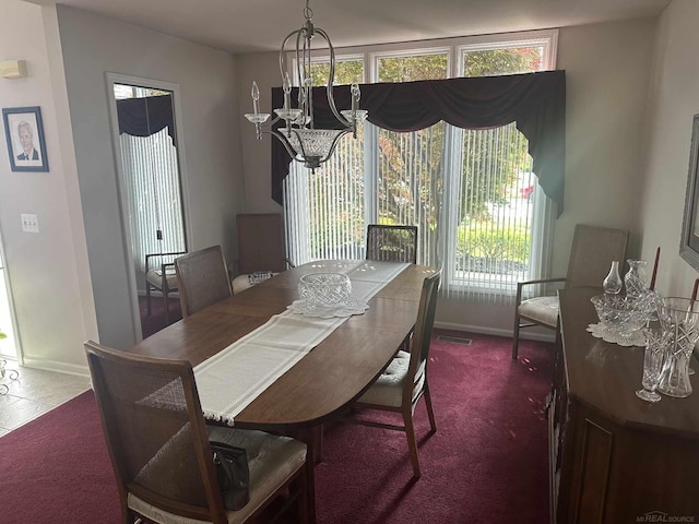 48274 Prestwyck Rd, Macomb, MI 48044 - dining room featuring a chandelier and plenty of natural light