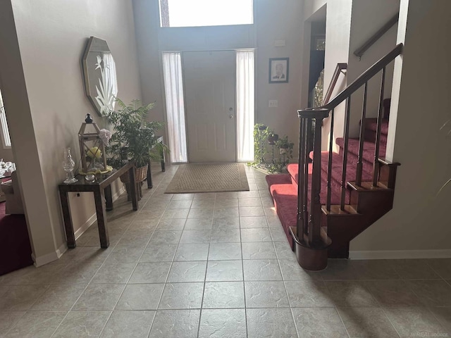48274 Prestwyck Rd, Macomb, MI 48044 - entryway featuring stairway, a high ceiling, and tile patterned floors