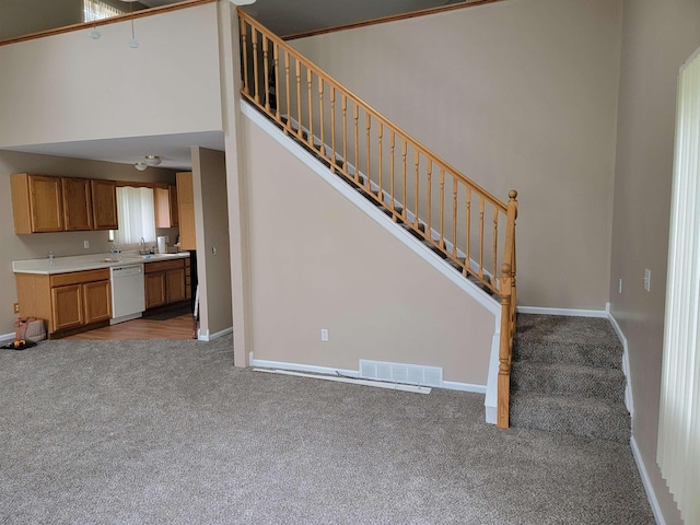4161 Pine St, Gladwin, MI 48624 - stairway featuring carpet flooring and baseboards
