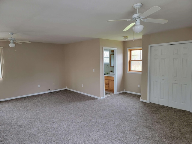 4161 Pine St, Gladwin, MI 48624 - unfurnished bedroom featuring carpet floors, ceiling fan, and a closet