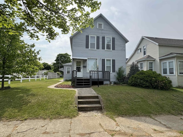 406 S 12th St, Escanaba, MI 49829 - view of front facade featuring a wooden deck