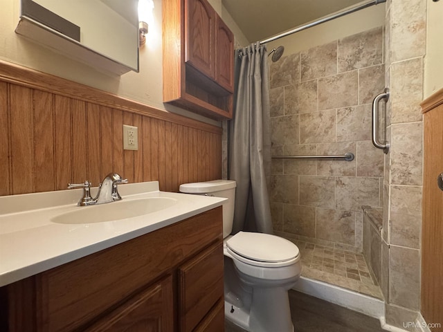 406 S 12th St, Escanaba, MI 49829 - full bath featuring a stall shower, vanity, and wainscoting